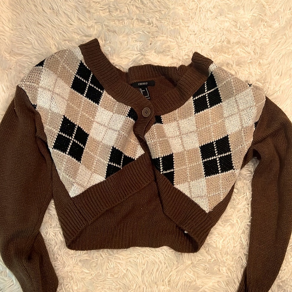 Brown argyle sweater. Can be worn as a cardigan. Work only twice.